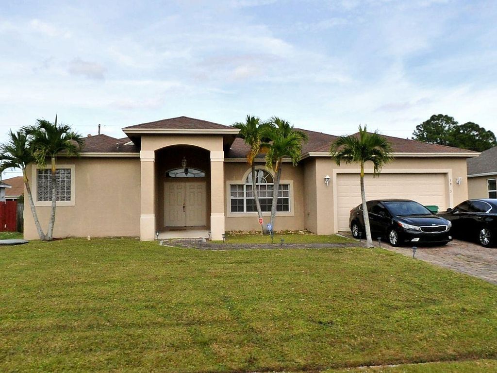 Photo of 1025 SW Dartmouth Avenue, Port Saint Lucie, FL 34953 (MLS # R11110542)