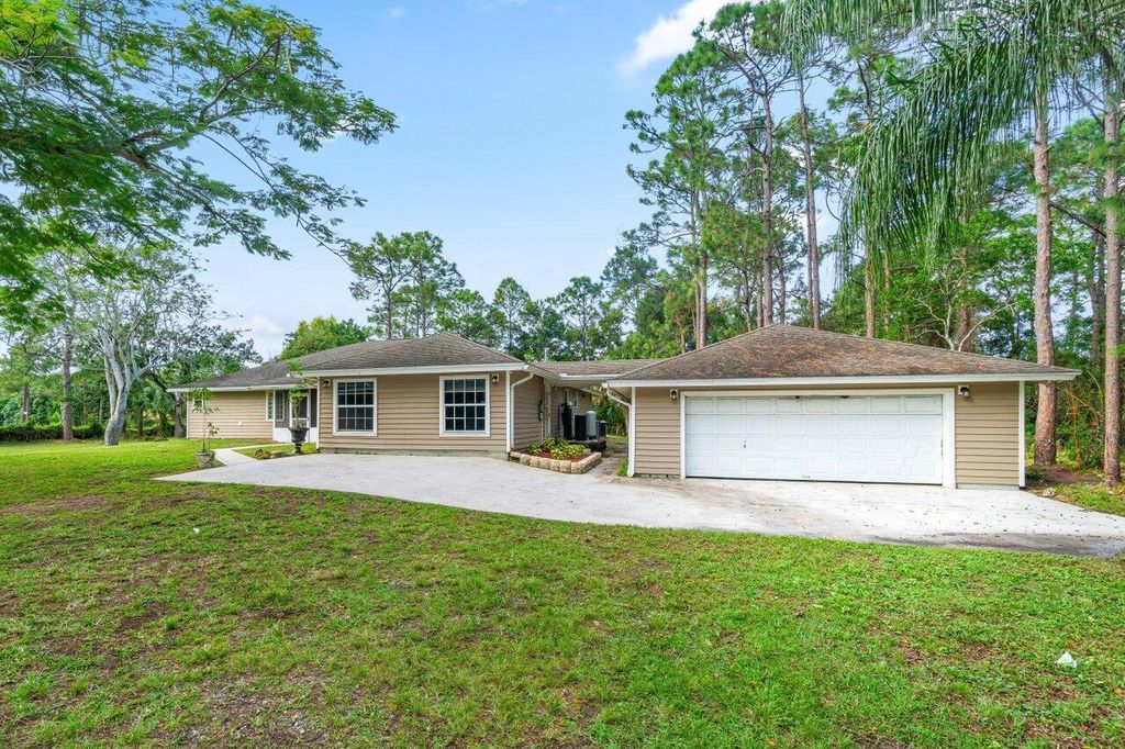 Photo of 14729 95th Lane N, West Palm Beach, FL 33412 (MLS # R11048367)