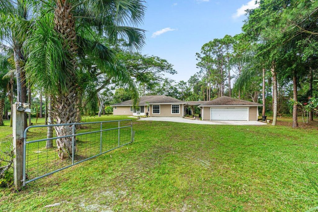 Photo of 14729 95th Lane N, West Palm Beach, FL 33412 (MLS # R11048367)