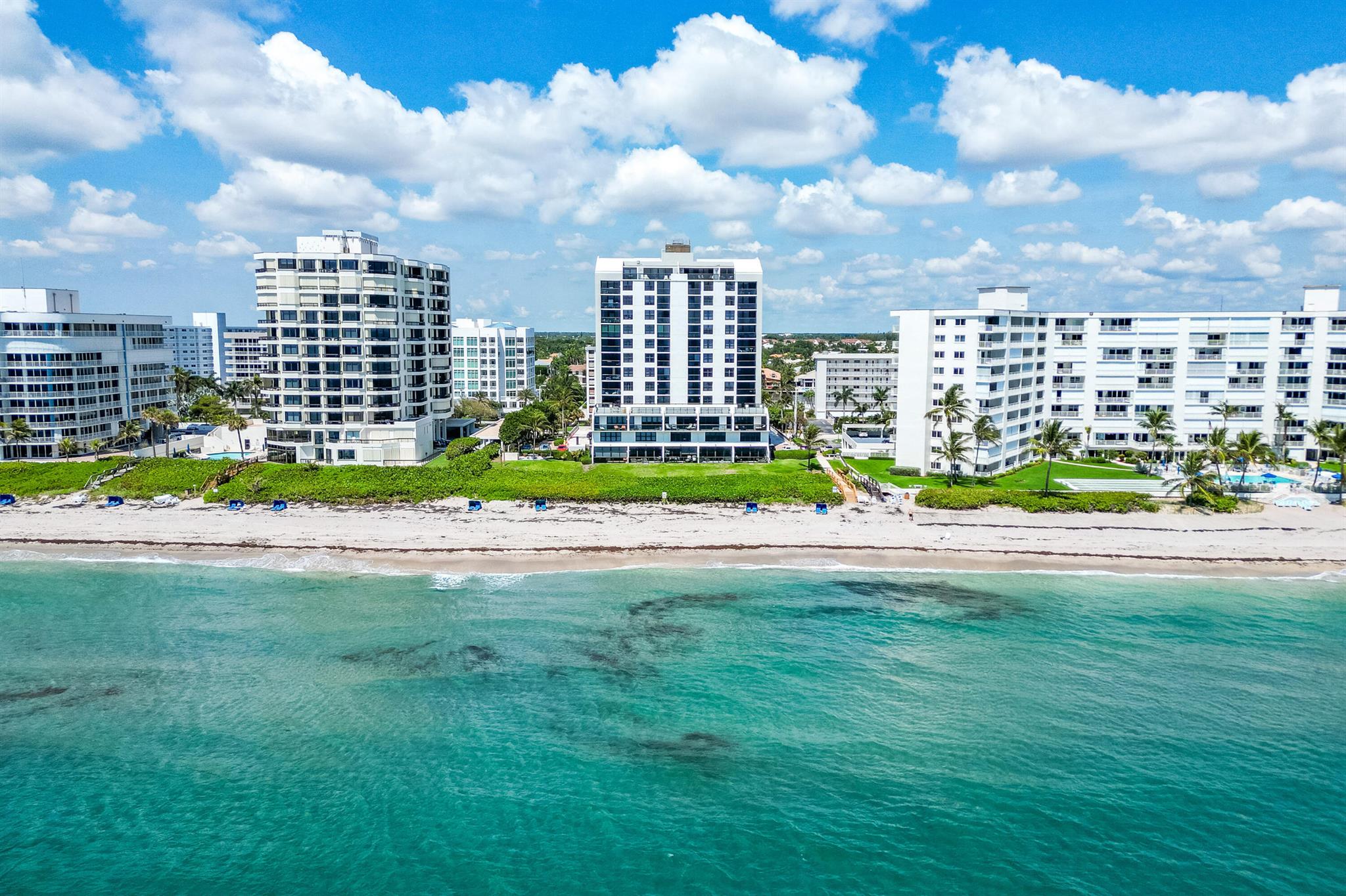 Experience the ultimate in oceanfront living in this extraordinary two-story penthouse in Highland Beach with panoramic ocean views from every room. Spanning 3,288 sq ft, this 3-bedroom residence features soaring double-height ceilings, an open loft, and a semi-private elevator. Enjoy seamless indoor-outdoor living with an expansive 400+ sq ft oceanfront terrace with breathtaking views, plus three additional terraces. Hurricane impact glass throughout. Luxury amenities include private beach access, attended lobby, security, fitness center, pool deck, and two garage spaces. A rare opportunity to own a one-of-a-kind penthouse offering scale, privacy, and breathtaking views in one of South Florida's most coveted beachfront communities. **SIRS completed and no special assessments!