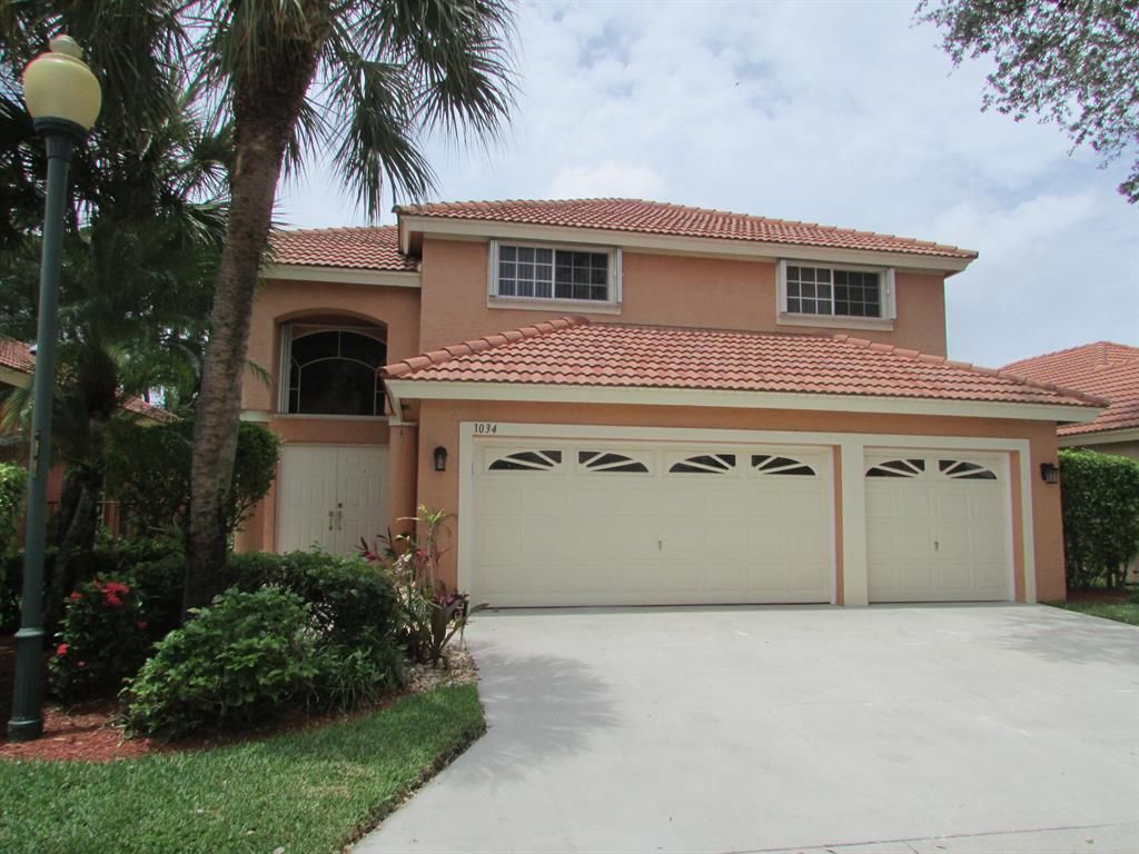 Photo of 1034 Aspri Way, Riviera Beach, FL 33418 (MLS # R10725345)
