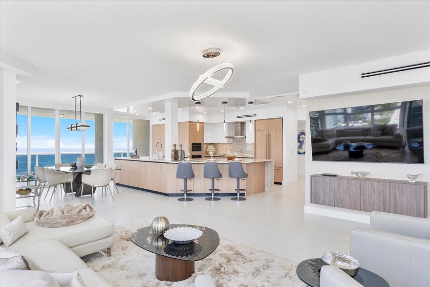 Direct Ocean BRAND NEW Double Corner Fully Furnished Custom Home with ItalKraft cabinetry and Caligarus furnishings throughout. Wide-Open Kitchen with Taj Mahal Slab countertops, extra cabinets and stretch ceiling. Sub Zero/Wolf appliances. 4'x4' porcelain slab flooring inside and out. Primary Suite features double door entry, large custom closet, New Bathroom featuring porcelain slab walls and custom vanities. 2nd Suite features similar features. Flexible 3rd bedroom includes custom cabinetry and double pocket doors. 2 large patio decks, private elevators, glass front doors. L'Hermitage offers over 10 acres of Oceanfront/Beachfront property with tennis, fitness, fenced complex, attended beach, pool deck restaurant.