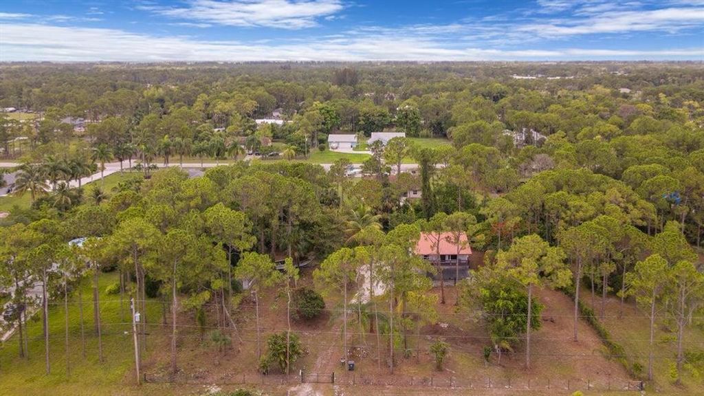 Photo of 15628 75 Th Lane N, Loxahatchee, FL 33470 (MLS # R10890464)