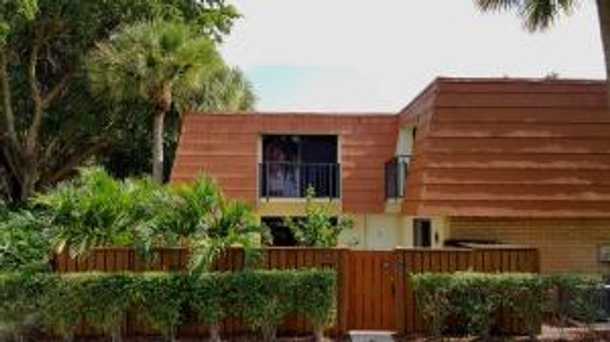 Open the gate to this beautiful private courtyard oasis and step into this tastefully updated townhouse in a very quiet location. This turn-key residence has top of the line LG appliances and is completely updated throughout. The owners took great pride in this property and no detail has been left undone. The unit features crown molding throughout, updated lights and fixtures, and upgraded plumbing. Great access to amenities nearby as this property is in the heart of Boynton Beach. Both bedrooms have a balcony overlooking the courtyard. The courtyard comes with a gas stainless steel grill. Two parking spots are included and small pets under 30 pounds are allowed. The air conditioner system is three years old.