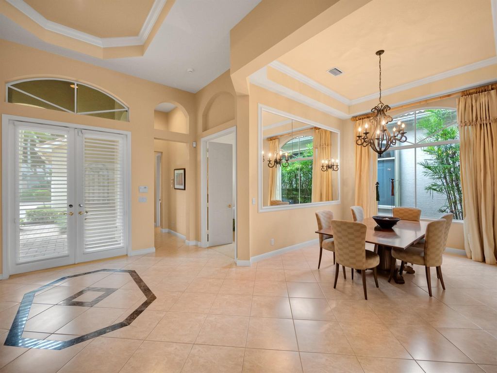 Photo of 103 Island Cove Way, Palm Beach Gardens, FL 33418 (MLS # R10921146)