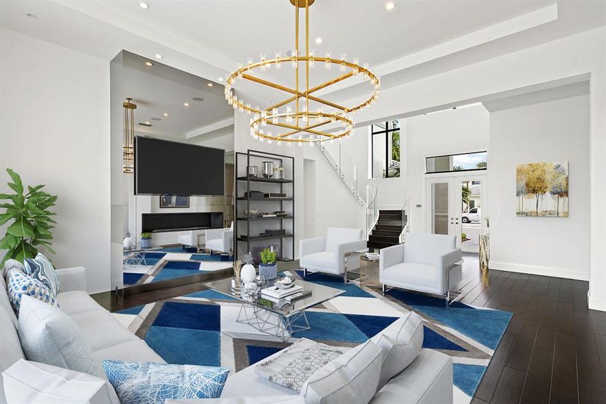 MOTIVATED SELLER!!! Modern Marvel furnished 6 bed 8.1 bath custom estate in renowned Seven Bridges, Delray Beach on a coveted lake lot with a ton of after market upgrades! Sparkling pool, private elevator & luxurious finishes make for one unforgettable retreat, complete w outdoor stainless & granite summer kitchen with TV. Light & airy interior of 7,879 sf with dramatic glass staircase, fireplace, motorized shades & designer wallcoverings. Gourmet kitchen shines with waterfall quartz, wood floors, SubZero-Wolf appliances plus huge walk-in pantry. A built-in banquette & modern bar with wine fridge offers added convenience. A private wine room offers space to house your collection. Unbelievable master with spa bath & French door veranda are a dream! Custom craftsmanship