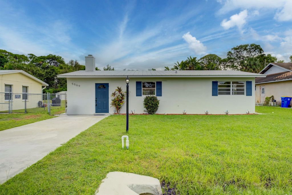 Photo of 5569 SE Normandy Avenue, Stuart, FL 34997 (MLS # R10933214)