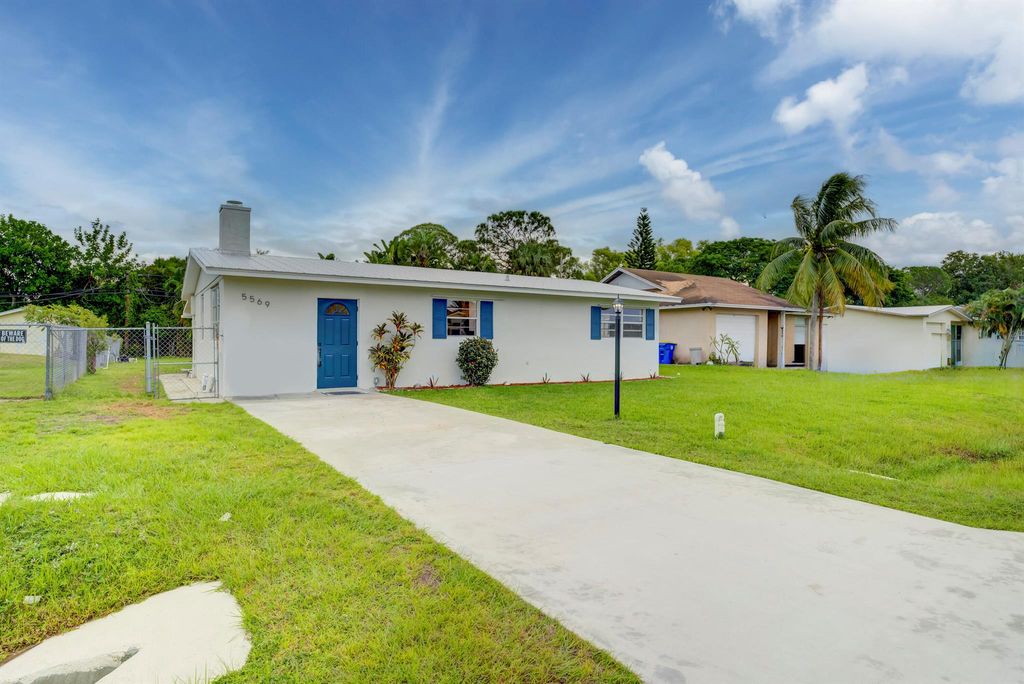 Photo of 5569 SE Normandy Avenue, Stuart, FL 34997 (MLS # R10933214)