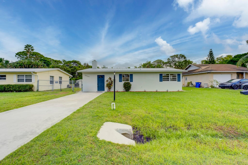 Photo of 5569 SE Normandy Avenue, Stuart, FL 34997 (MLS # R10933214)
