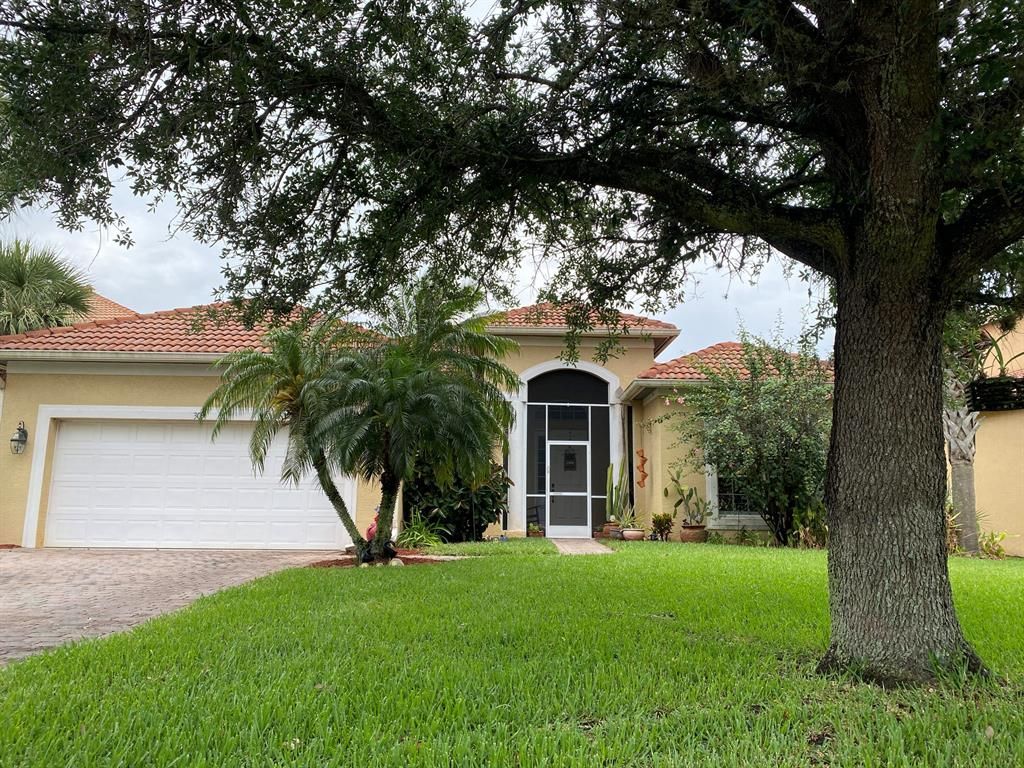 Photo of 303 NW Binghampton Lane, Port Saint Lucie, FL 34983 (MLS # R10710307)