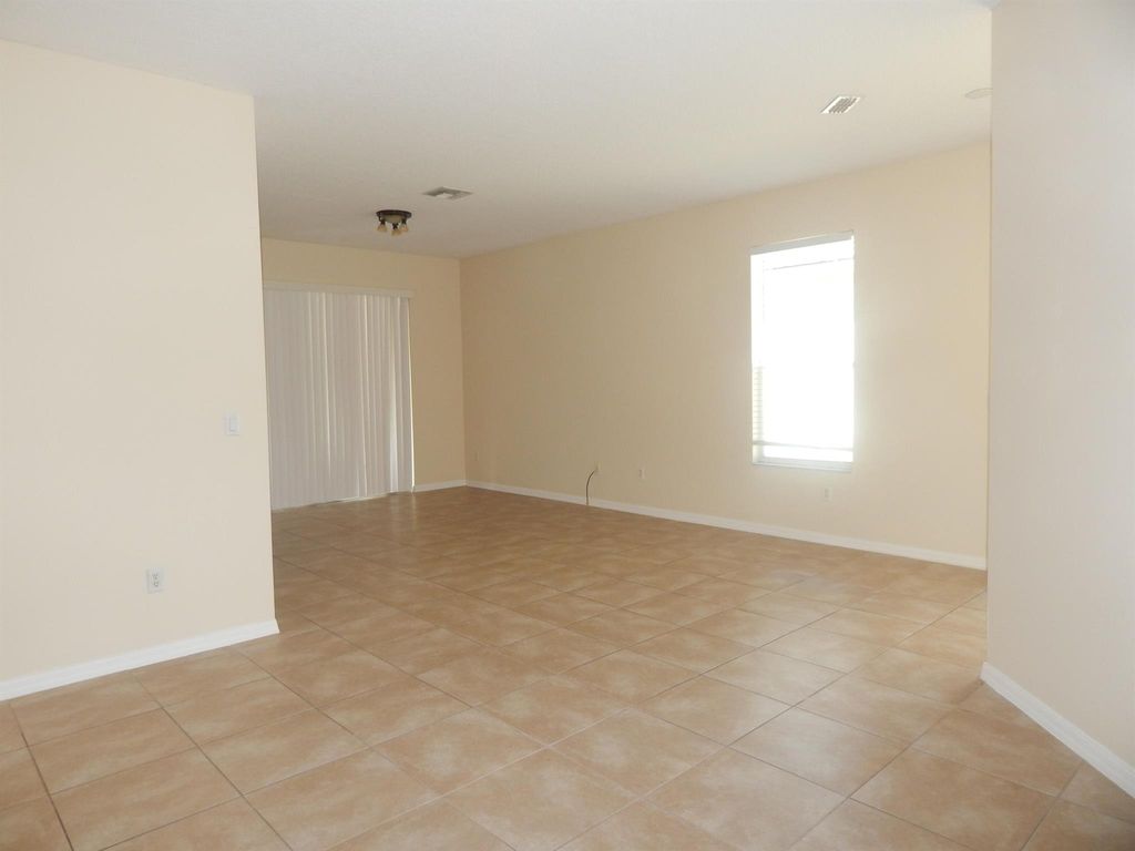 Photo of 10123 SW Brookgreen Drive, Port Saint Lucie, FL 34987 (MLS # R11024305)