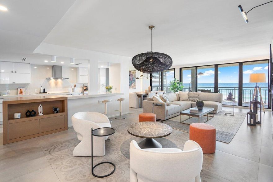 Totally renovated, reconfigured, and reimagined to create the ultimate direct ocean front 3 bedroom, 2 bath residence with direct east, south and westerly water views from within and on the wrap around spacious balcony which creates a second living area.  Fully furnished with Sophisticated, chic, and a beautiful neutral pallet of designer furniture and furnishings.  Open kitchen with an induction oven top, porcelain tile flooring throughout, hurricane impact sliding doors, spacious laundry room, bar, and a special vapor fireplace in the living area.  PLUS a poolside cabana that is enclosed with hurricane impact doors, open kitchen, full bath and storage area.  The Cabana is perfect for an office/den and easy access to the resort style pool and wide expansive beach .