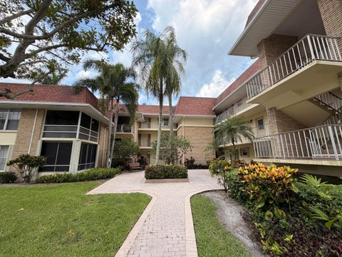 Photo of 5570 Tamberlane Circle #229, Palm Beach Gardens, FL 33418 (MLS # B26041446)