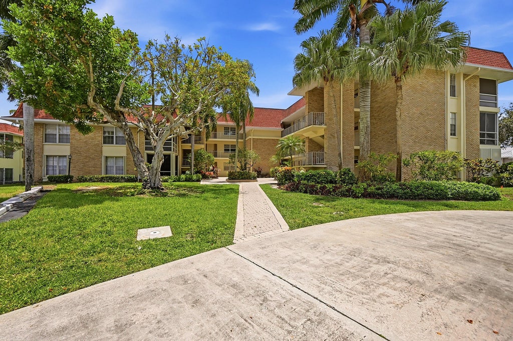 Photo of 5570 Tamberlane Circle #229, Palm Beach Gardens, FL 33418 (MLS # B26041446)