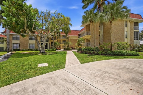 Photo of 5570 Tamberlane Circle #229, Palm Beach Gardens, FL 33418 (MLS # B26041446)