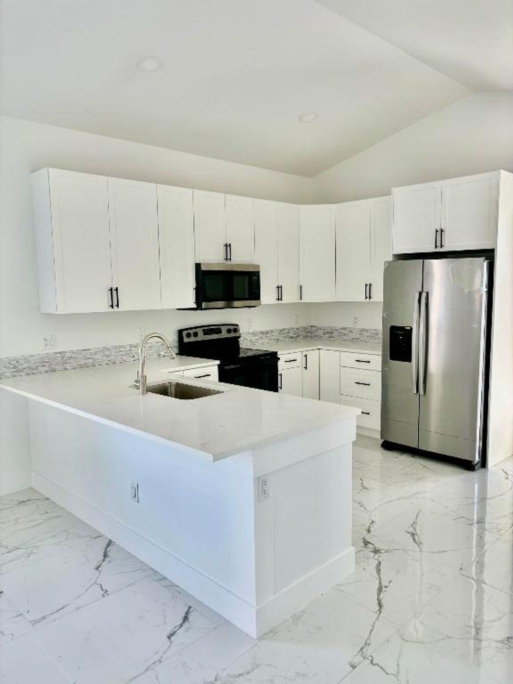 Photo of 1192 Highview Rd, Lake Worth, FL 33462 (MLS # R10959446)