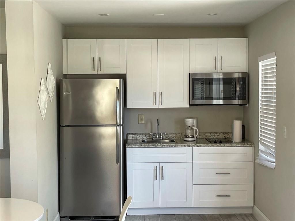 Photo of 1959 SE 3rd Street #A, Deerfield Beach, FL 33441 (MLS # F10435916)