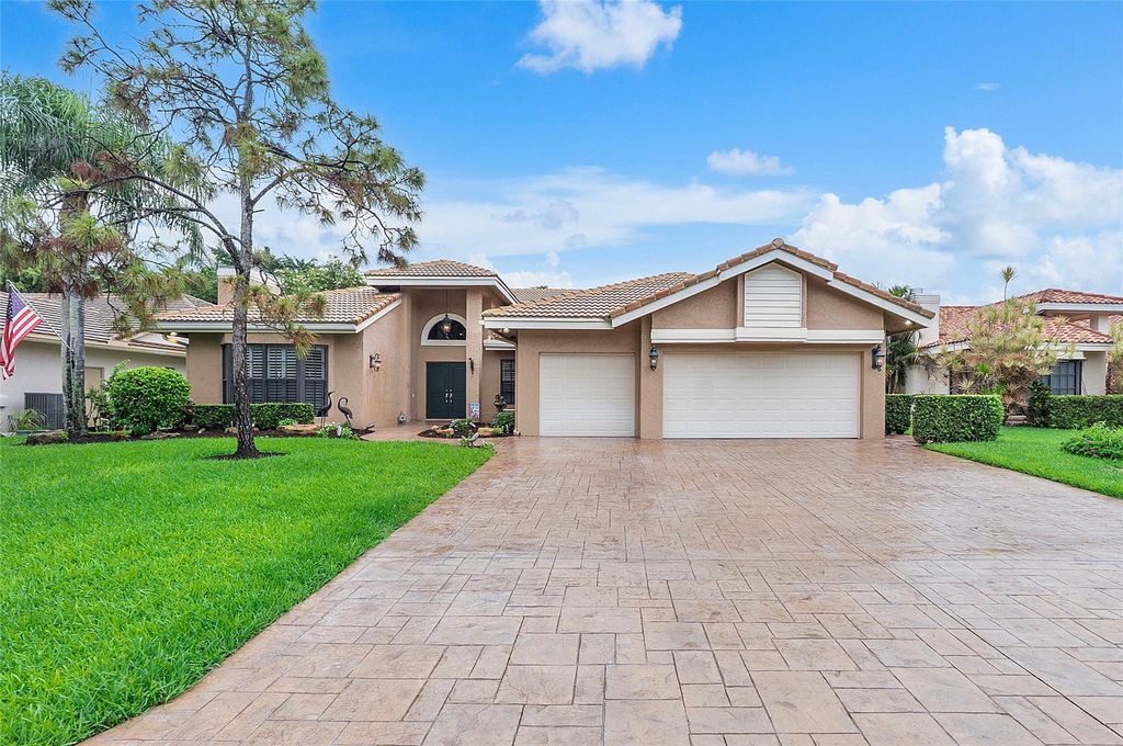 Photo of 6021 NW 60th Court, Parkland, FL 33067 (MLS # F10449274)