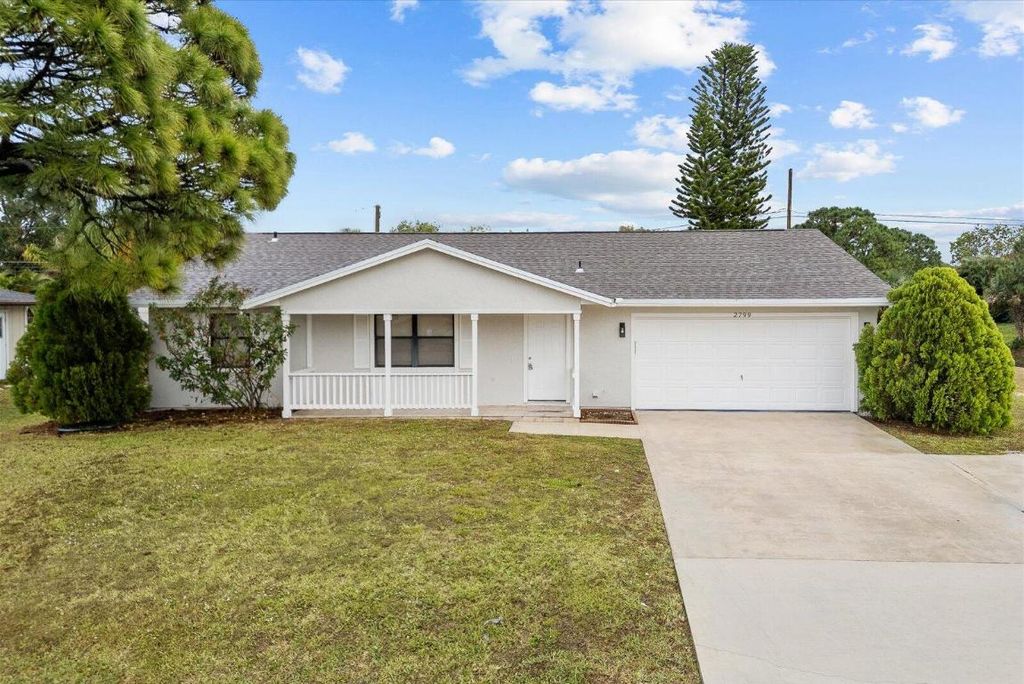 Photo of 2799 SW Savona Boulevard, Port Saint Lucie, FL 34953 (MLS # R11158144)