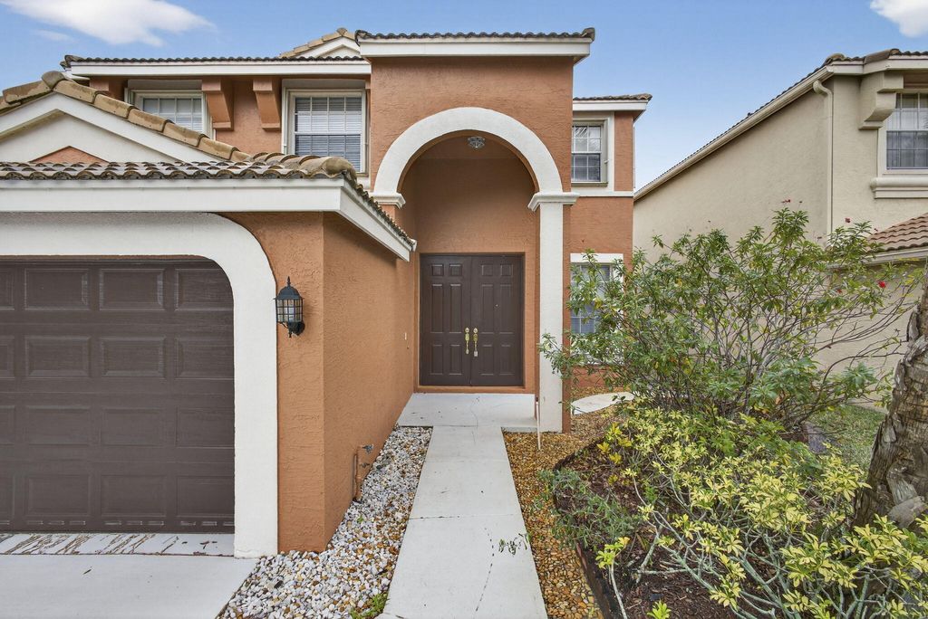 Photo of 1510 Running Oak Lane, Royal Palm Beach, FL 33411 (MLS # R11155136)