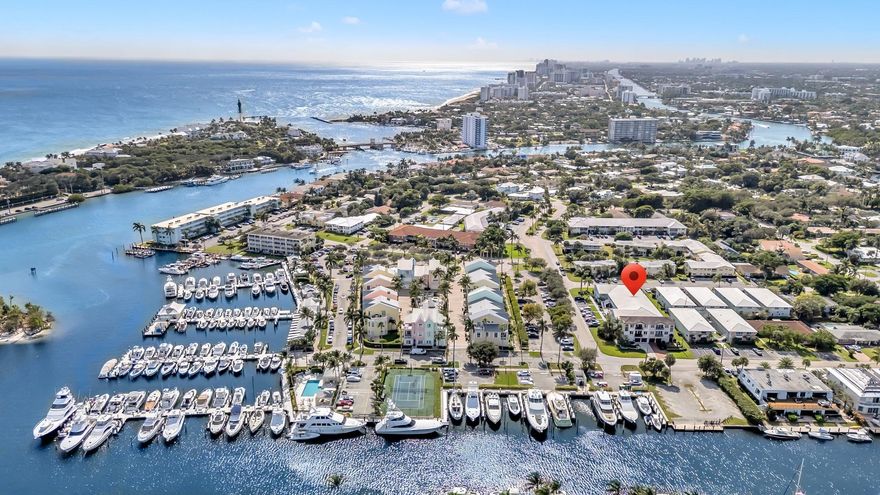 Sought after Lighthouse Point Condo right next to the Marina, open concept 1 Bedroom, 1.5 Bath on the first floor with a screened in Patio. The kitchen is modern open & upgraded. The Bedroom offers a large closet, Large full Bathroom with an incredible space that offers storage & in unit washer & Dryer. There is tile flooring throughout the unit. The Association allows rentals after 2 years. Ample storage including a separate storage locker. Centrally located to Hillsboro Beach 4.2 miles away. Dockside dining & boating just outside your door! Plenty of shops & restaurants for entertainment & fun. Open your front door & feel the breeze coming off the water. Don't miss out on this Open-concept Condo that offers coastal flair. Perfect for seasonal escapes or full-time paradise living.