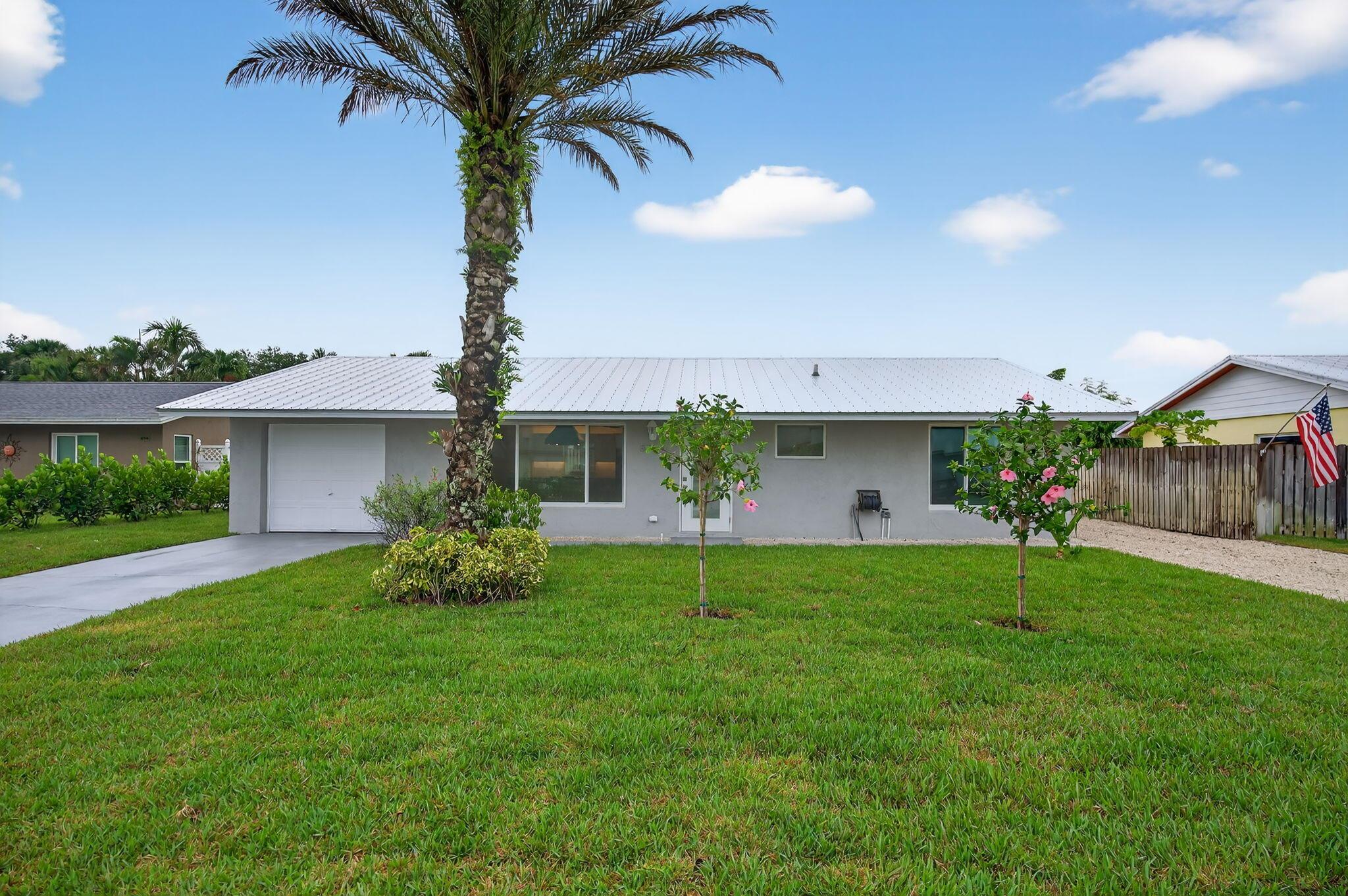 Completely remodeled open floor plan. Everything is new. Impact windows. Metal roof. Side gates being added for additional security. Second driveway for a boat or RV to park. Fruit trees. Sunporch/awning also being added soon. Lawn care, water and sewer included. 700 credit score. NO PETS. Verify room sizes.