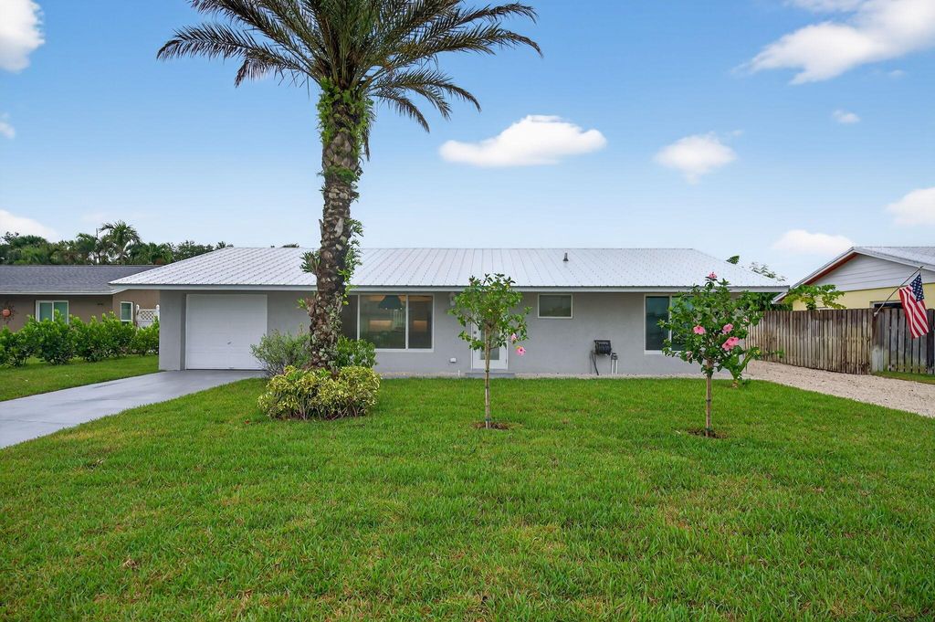 Photo of 8776 SE Sandy Lane, Hobe Sound, FL 33455 (MLS # R11110035)