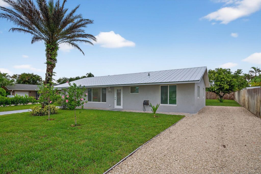 Photo of 8776 SE Sandy Lane, Hobe Sound, FL 33455 (MLS # R11110035)