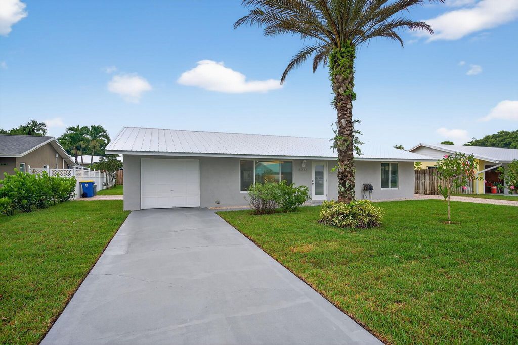 Photo of 8776 SE Sandy Lane, Hobe Sound, FL 33455 (MLS # R11110035)