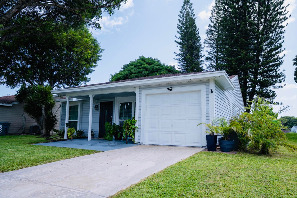 Photo of 9060 CHRYSANTHEMUM Drive, Boynton Beach, FL 33472 (MLS # B26066659)