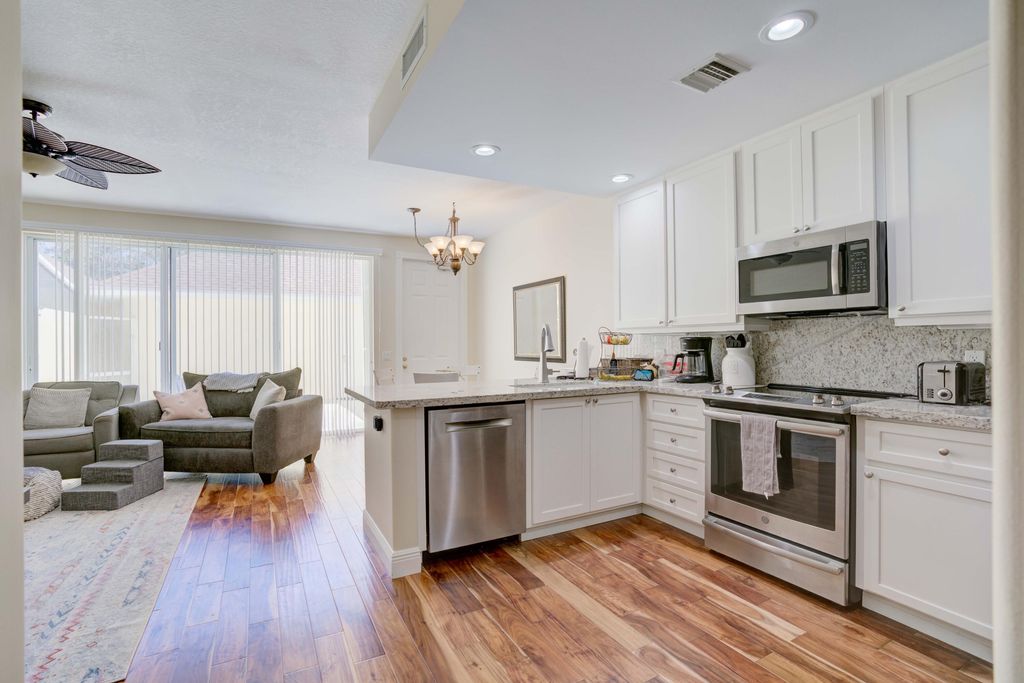 Photo of 281 New Haven Boulevard, Jupiter, FL 33458 (MLS # R10870391)