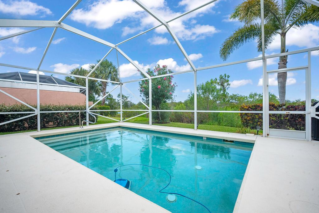 Photo of 10751 SW Elsinore Drive, Port Saint Lucie, FL 34987 (MLS # R10992086)