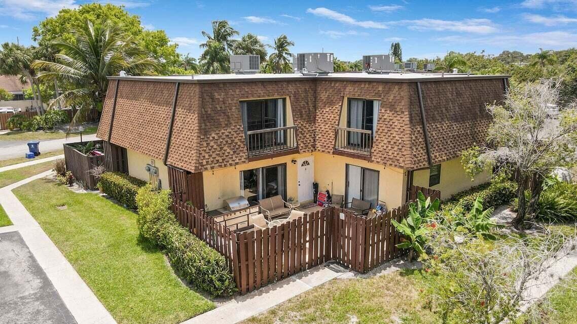 Great Townhome located in the boating community of Sims Creek . Located within Jupiters A rated school district. Beautiful onsite community pool and clubhouse.This delightful townhome features New Roof and new AC. Nicely appointed kitchen separate and spacious, laundry downstairs with half bath.2 large bedrooms up stairs, each with their own bath both rooms have a balcony overlooking the patio and green space .Huge Patio for barbecuing and entertaining.Minutes to Jupiter beaches and great restaurants Hurry this won't last!!