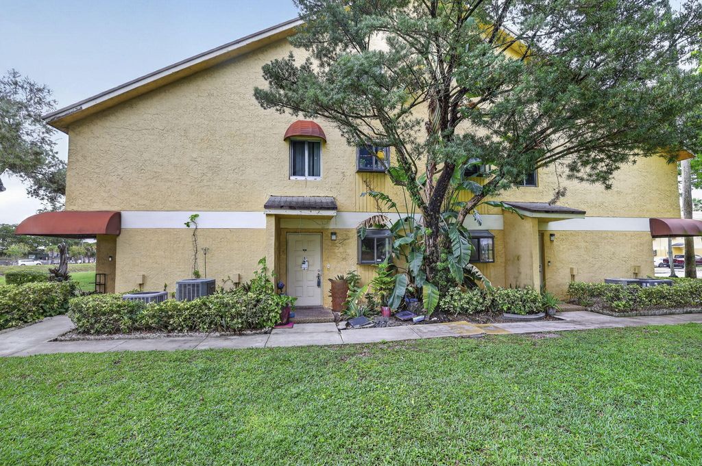 Photo of 3041 N Oakland Forest Drive #103, Oakland Park, FL 33309 (MLS # B26025083)