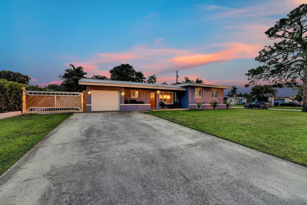 Photo of 5574 Lake Osborne Drive, Lake Worth, FL 33461 (MLS # B26007850)