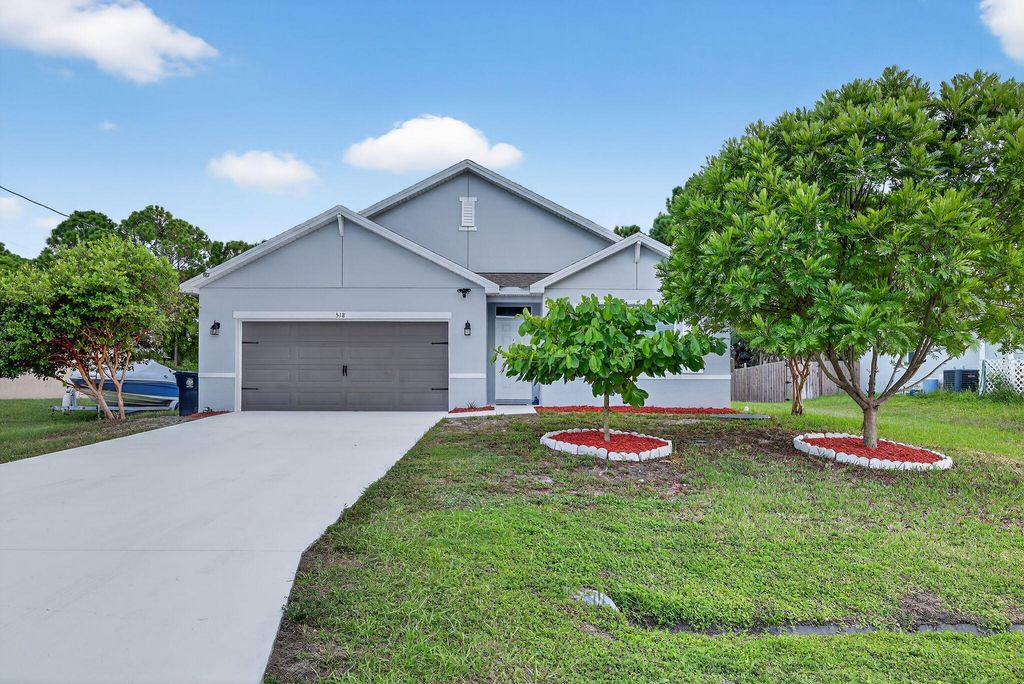 Photo of 518 SW Natalie Terrace, Port Saint Lucie, FL 34953 (MLS # R11118283)