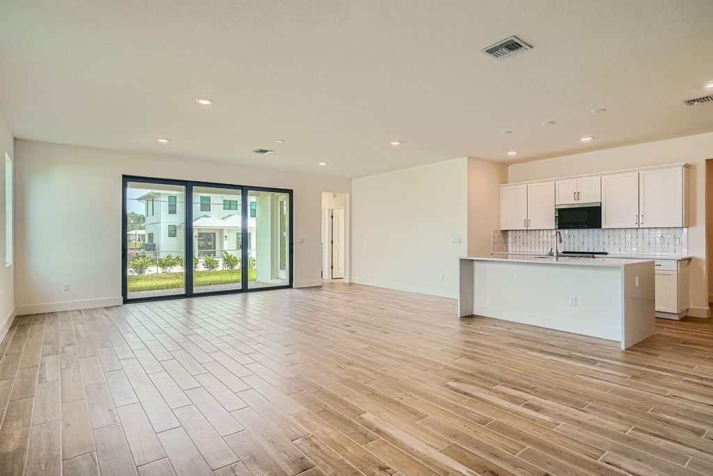 Photo of 1440 SW Lago Circle, Palm City, FL 34990 (MLS # R10990888)