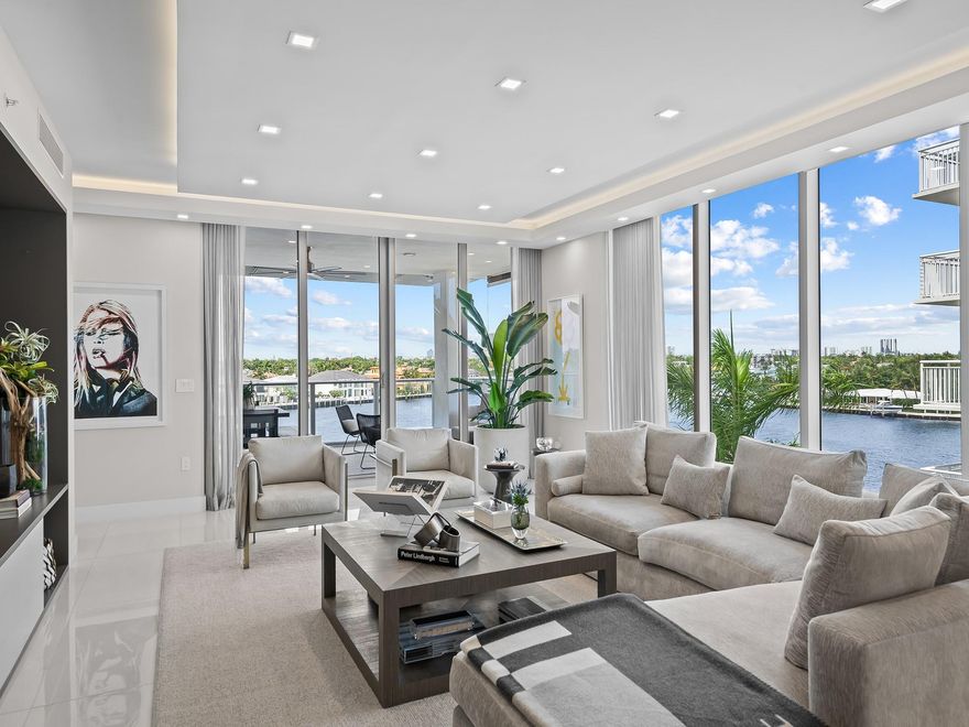 PRESTIGIOUS CONTEMPORARY BOUTIQUE BUILDING OF ADAGIO! BUILT IN 2020! PRIVATE DEEDED BOAT SLIP INCLUDED! PANORAMIC SWEEPING DIRECT INTRACOASTAL VIEWS! CONSTANT BOAT PARADE & STUNNING SUNSETS! PROFESSIONALLY DECORATED BY SLK INTERIORS, HIGH END  PREMIUM FINISHES THROUGHOUT! 3786 SF GROSS WRAPAROUND UNIT 4 BED/3.5 BATHS, SPLIT FLOOR PLAN WITH SECOND MEDIA ROOM! HUGE WATERFRONT BALCONY WITH OUTDOOR KITCHEN, ICE MAKER AND BBQ GRILL! CUSTOM GOURMET GAS KITCHEN WITH HIGHEST GRADE GAGGENAU APPLIANCES! 2 PREMIUM PARKING SPACES CONVEY! POTENTIAL FOR 3 CARS WITH LIFT! FURNITURE NOT INCLUDED IN PRICE BUT COULD BE SOLD TURNK KEY!  YOU CAN HAVE IT ALL, WALK TO BEACH, STUNNING VIEWS, DEEDED BOAT SLIP & BETTER THAN NEW BOUTIQUE 31 UNIT BUILDING WITH STYLE! COME TOUR THIS INCREDIBLE RESIDENCE IN THE SKY!