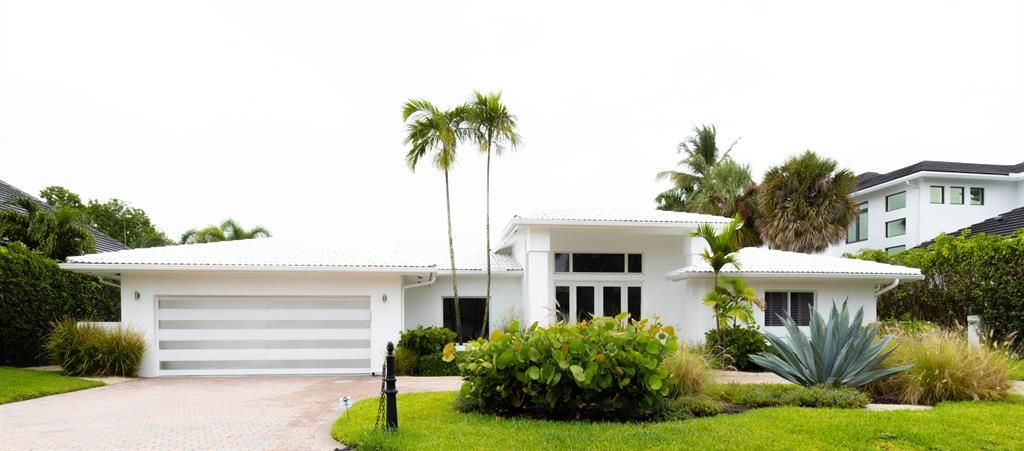 Photo of 2388 Queen Palm Road, Boca Raton, FL 33432 (MLS # R10821767)