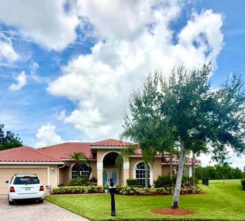 Photo of 261 SW EGRET Landing, Port Saint Lucie, FL 34953 (MLS # B26059204)