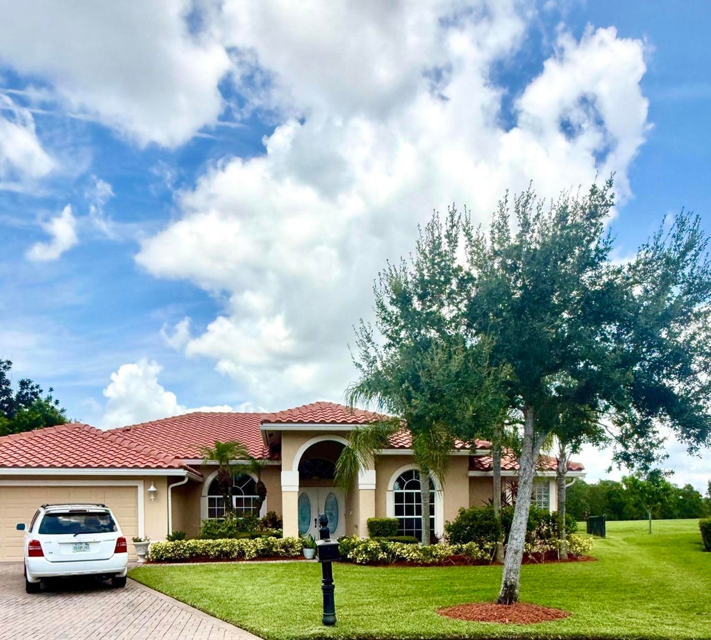 Photo of 261 SW EGRET Landing, Port Saint Lucie, FL 34953 (MLS # B26059204)
