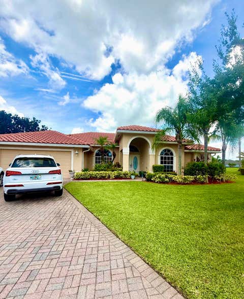 Photo of 261 SW EGRET Landing, Port Saint Lucie, FL 34953 (MLS # B26059204)
