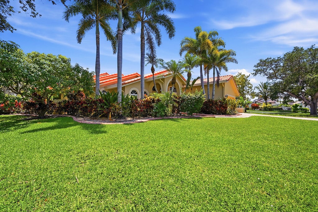 Photo of 9700 NW 48th Drive, Coral Springs, FL 33076 (MLS # B26041401)