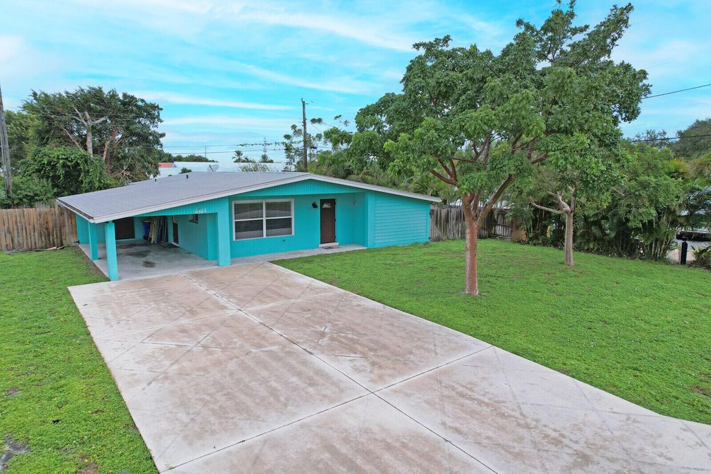 Photo of 8151 SE Evergreen Street, Hobe Sound, FL 33455 (MLS # R11163830)