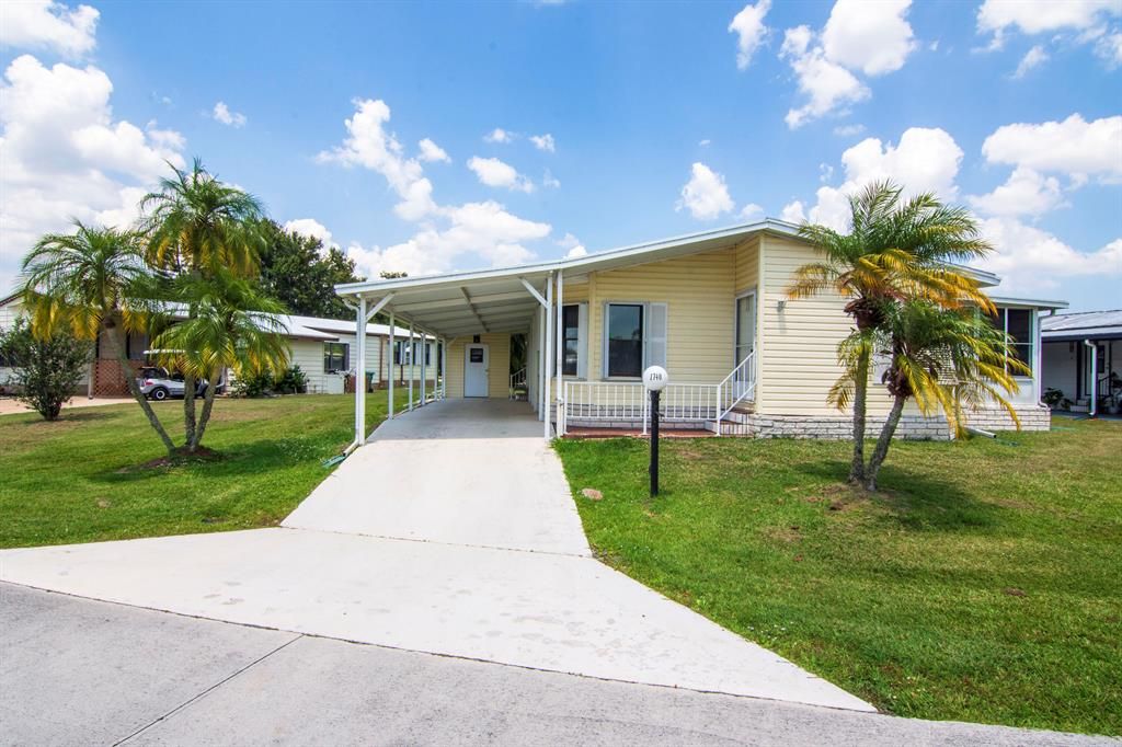 Photo of 1740 Golden Pond Drive, Fort Pierce, FL 34945 (MLS # R10891208)