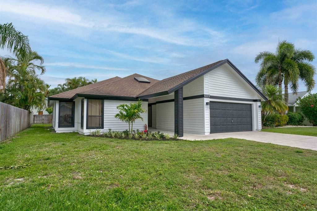 Photo of 6039 Adams Street, Jupiter, FL 33458 (MLS # R10788710)