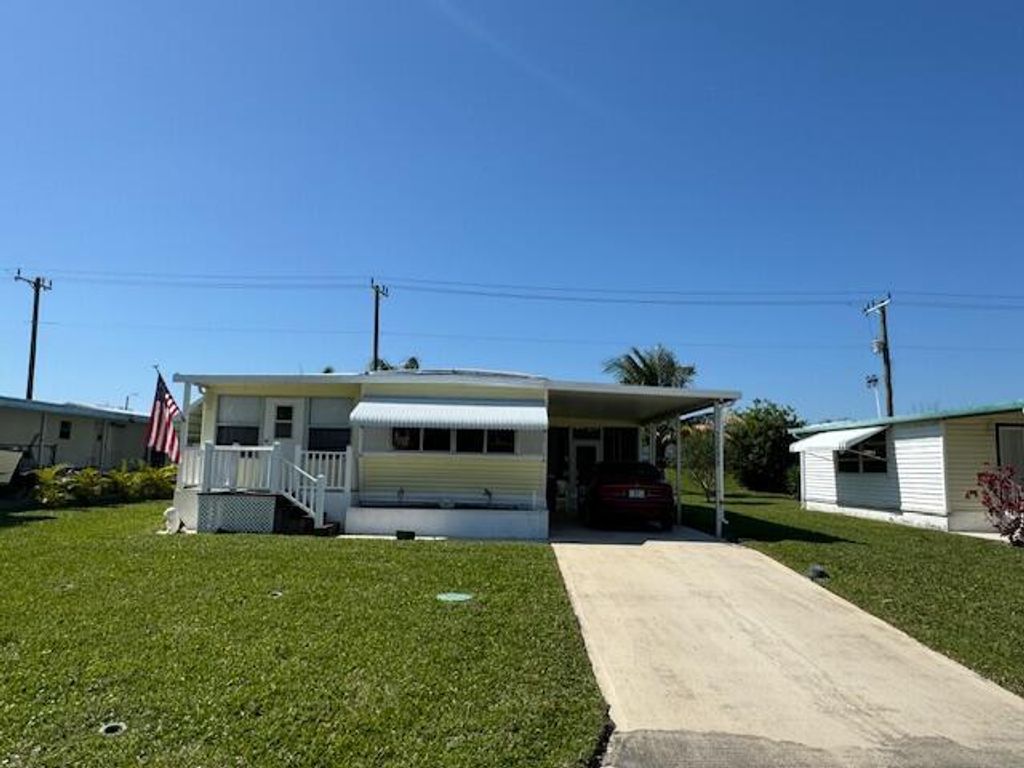 Photo of 7298 SE Swan Avenue, Hobe Sound, FL 33455 (MLS # R10963205)