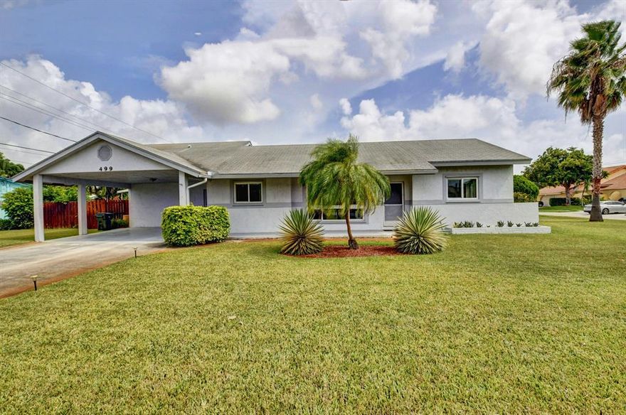 3 bedroom/3 bath home on a nice corner lot with 2 vehicle carport.  Perfect East Boca location only 1 mile to the ocean! Top rated Boca schools, walk to supermarkets, shopping and fine restaurants.  Impact windows and sliders partial. Great curb appeal. This home has almost 1600 sq ft in this sought after area close to everything.  If you love East Boca, don't miss seeing this one.