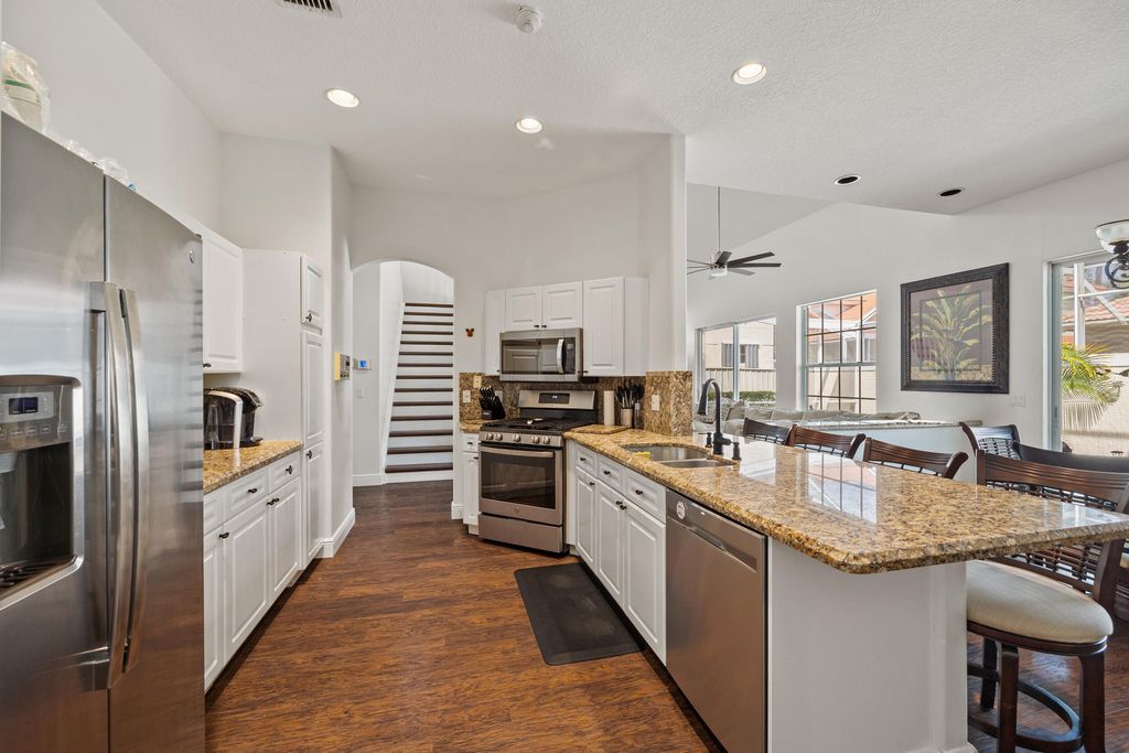 Photo of 33 Monterey Pointe Drive, Palm Beach Gardens, FL 33418 (MLS # B26026181)