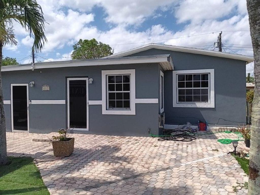 Photo of 2215 NW 9th Ct, Fort Lauderdale, FL 33311 (MLS # F10527550)